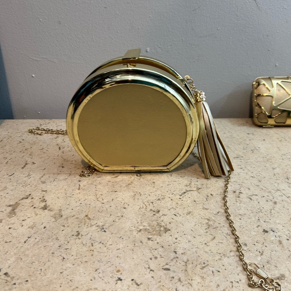 Gold Round‎ Framed Evening Bag with tassels, gold chain strap and hardware